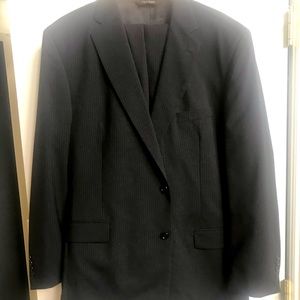 Men’s black pinstriped Jos A Banks suit.